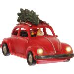 Père Noël dans sa VW Coccinelle